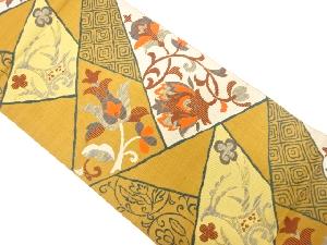 切り嵌め風唐花に抽象動物模様織出し袋帯